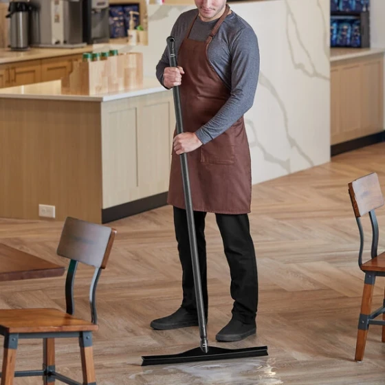 Vikan 23 5/8" Black Ultra-Hygienic Single Blade Rubber Floor Squeegee with 59 1/8" Ultra-Hygienic Handle