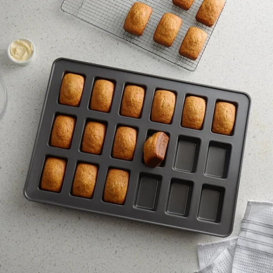 Wilton 191002369 Perfect Results Steel 18-Compartment Premium Non-Stick Mini Loaf Pan - 3 3/4" x 2 1/4" x 1 1/4" Cavities