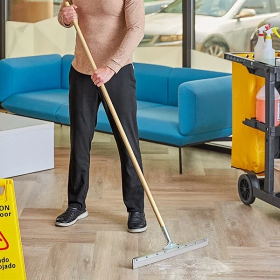 Lavex 24" Heavy-Duty Rubber Floor Squeegee with Metal Frame and 60" Wood Handle