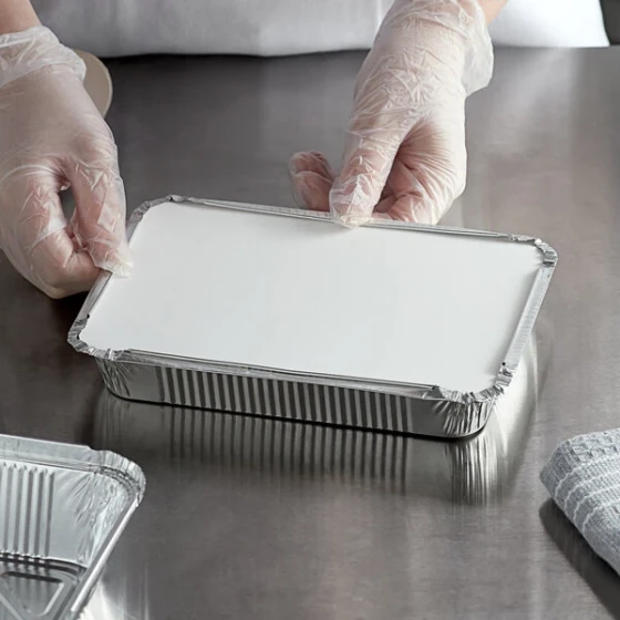 Choice 1.5 lb. Shallow Oblong Foil Take-Out Container with Board Lid - 50/Pack