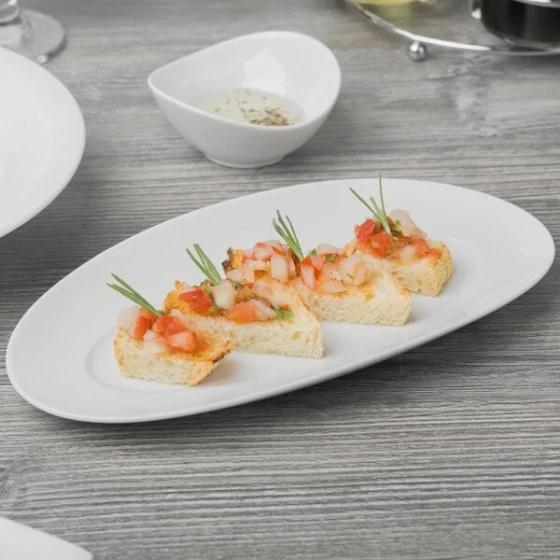 Schonwald 9392226 Grace 10 1/2" x 5 1/2" Continental White Porcelain Oval Platter - 6/Case