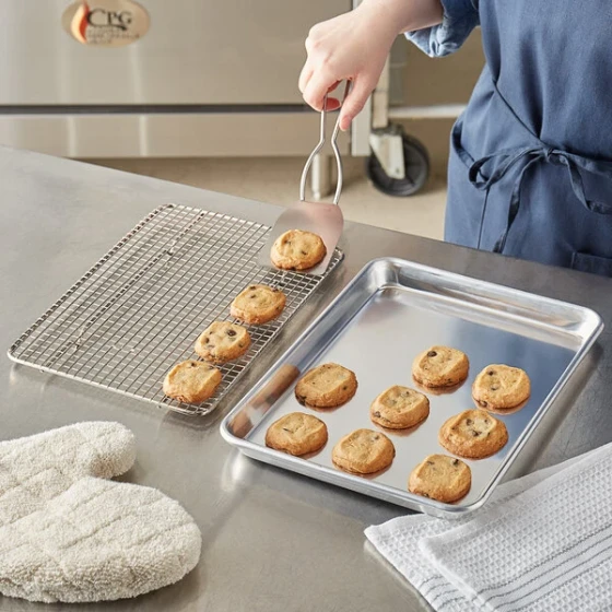 Choice Quarter Size 19 Gauge 9 1/2 inch x 13 inch Wire in Rim Aluminum Sheet Pan with Footed Cooling Rack