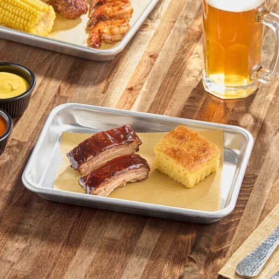 Baker's Lane Heavy-Duty Eighth Size 16 Gauge 6 1/2 inch x 9 1/2 inch Wire in Rim Aluminum Bun / Sheet Pan