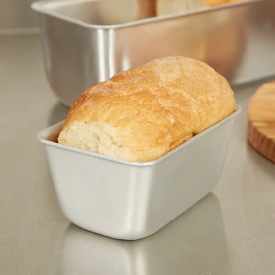 Vollrath 5431 Wear-Ever 1 lb. Seamless Aluminum Bread Loaf Pan - 5 inch x 3 3/8 inch x 2 1/2 inch