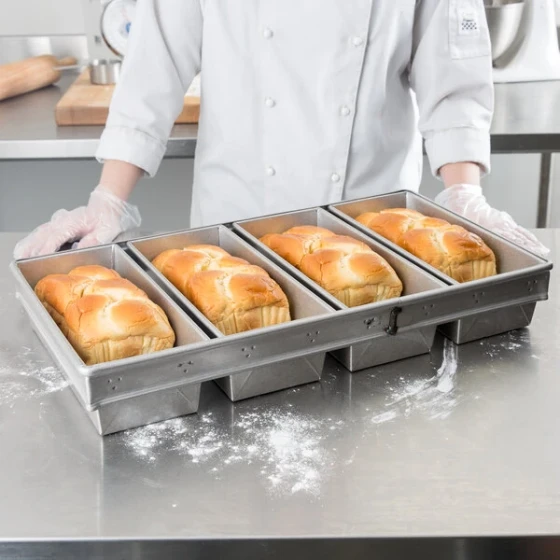 Chicago Metallic 44765 1 1/2 lb. 4-Strap Glazed Aluminized Steel Bread Loaf Pan - 12 inch x 5 inch x 3 1/2 inch
