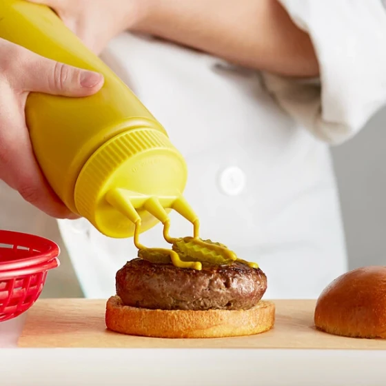 Vollrath 3324-1308 Traex® Color-Mate™ 24 oz. Clear Tri Tip™ Wide Mouth Squeeze Bottle with Yellow Cap