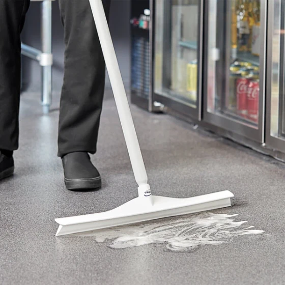 Vikan 71605 23 5/8" White Ultra-Hygienic Single Blade Rubber Floor Squeegee with Plastic Frame
