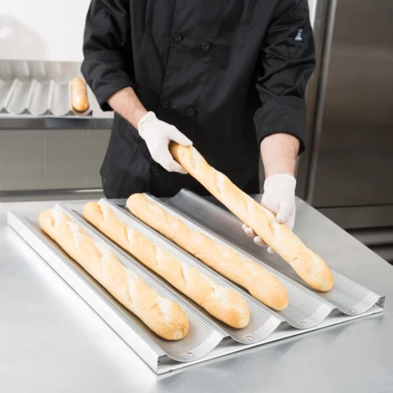 Chicago Metallic 49034 4 Loaf Glazed Uni-Lock Aluminum Baguette / French Bread Pan - 25 3/4 inch x 3 7/8 inch x 1 inch Compartments