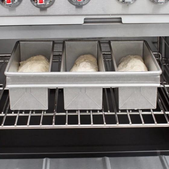 Chicago Metallic 45635 1 lb. 3-Strap Glazed Aluminized Steel Bread Loaf Pan - 9 inch x 4 1/2 inch x 2 3/4 inch