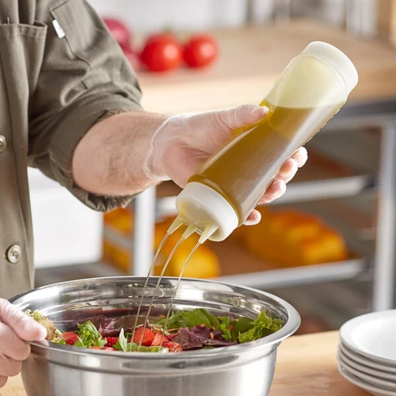 Vollrath Traex® 24 oz. Clear FIFO Squeeze Dispenser with Clear Tri Tip™ Cap and Base Cap