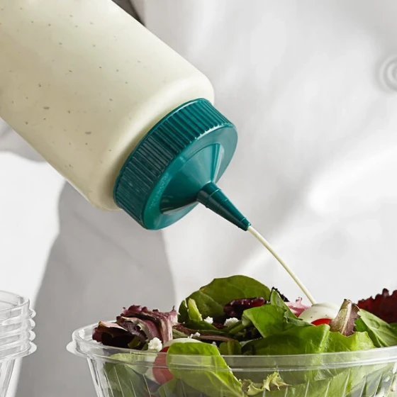 Vollrath 4924-13191 Traex® Color-Mate™ 24 oz. Clear Single Tip Wide Mouth Squeeze Bottle with Vista Green Cap