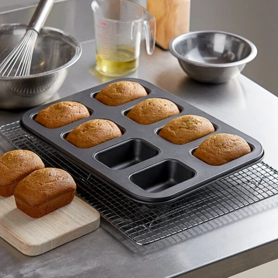 Baker's Lane 8 Compartment Non-Stick Carbon Steel Mini Bread Pan - 5 oz. Capacity, 3 5/8 inch x 2 3/8 inch x 1 3/8 inch Cavities