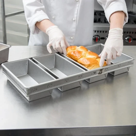 Chicago Metallic 49415 1 1/2 lb. 4-Strap Glazed Aluminized Steel Bread Loaf Pan - 10 inch x 5 inch x 3 inch