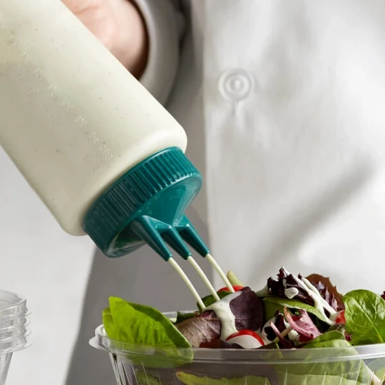 Vollrath 3332-13191 Traex® Color-Mate™ 32 oz. Clear Tri Tip™ Wide Mouth Squeeze Bottle with Vista Green Cap