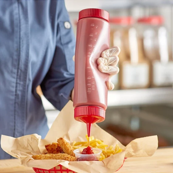 Vollrath Traex® 24 oz. Clear FIFO Squeeze Dispenser with Red Single Tip Cap and Base Cap