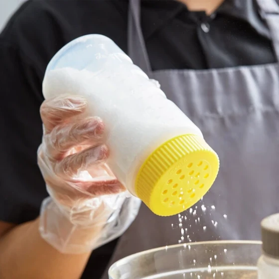 Vollrath 4961-1308 Traex® Dripcut® 16 oz. Polyethylene Shaker / Dredge with Large-Hole Yellow Lid