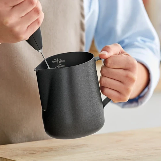 Acopa 20 oz. Black Frothing Pitcher with Measuring Lines