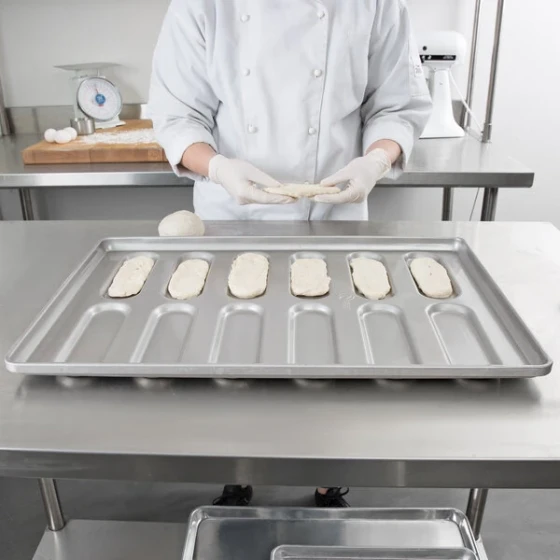 Chicago Metallic 41055 Glazed Aluminized Steel Rounded End Hoagie Bun Pan - 12 Molds
