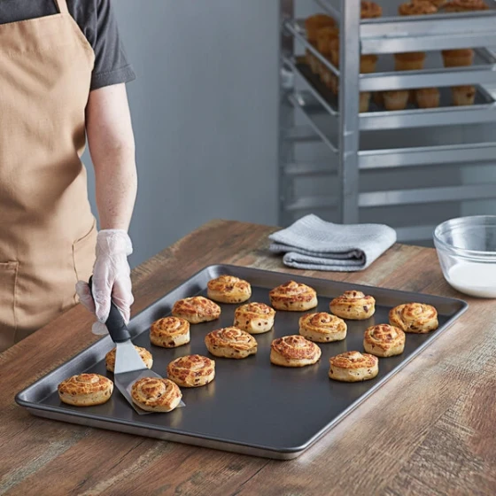 Vollrath 9002NS Wear-Ever Full Size 18 Gauge Non-Stick 18 inch x 26 inch Wire in Rim Aluminum Bun / Sheet Pan