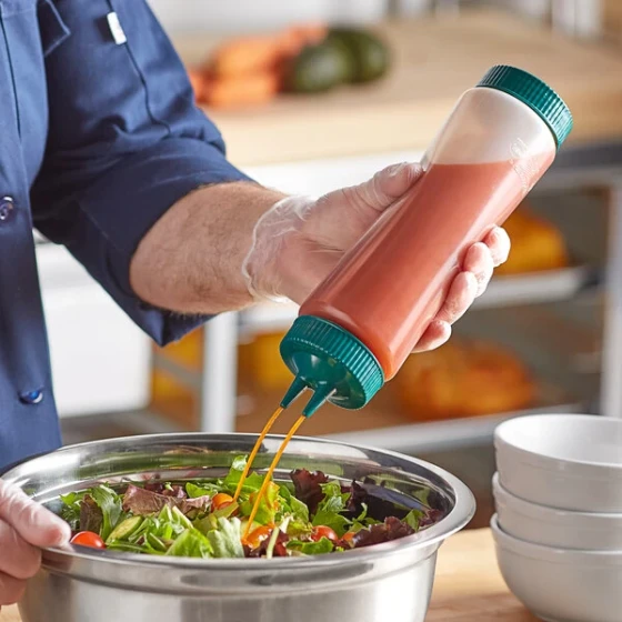 Vollrath Traex® 24 oz. Clear FIFO Squeeze Dispenser with Green Twin Tip™ Cap and Base Cap