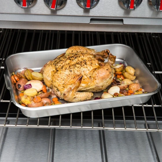 Vollrath 61270 6.5 Qt. Stainless Steel Baking and Roasting Pan with Handles - 18 1/8" x 12 3/8" x 2 3/8"