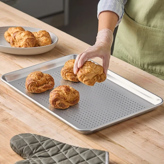 Choice Half Size 19 Gauge 13 inch x 18 inch Wire in Rim Aluminum Perforated Bun / Sheet Pan