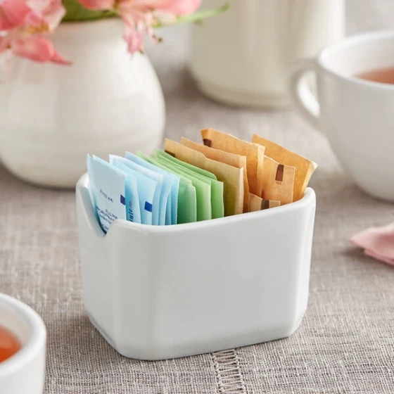 Tuxton BPQ-034 3 1/2" x 2 7/8" Porcelain White Rectangular China Sugar Packet Holder - 12/Case