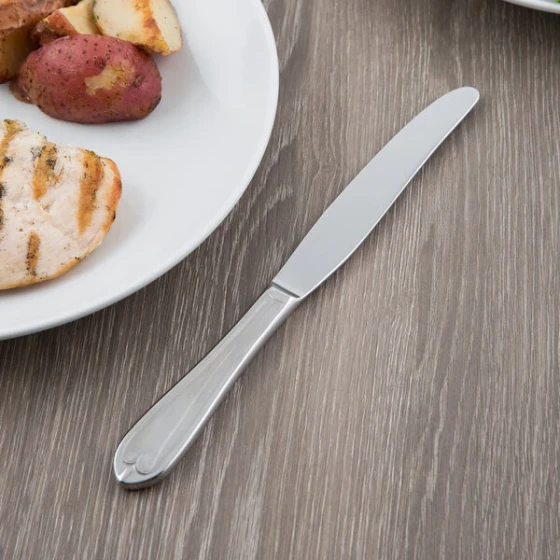 Libbey 239 5502 Antique 9 1/2" 18/0 Stainless Steel Heavy Weight Fluted Solid Handle Dinner Knife - 36/Case