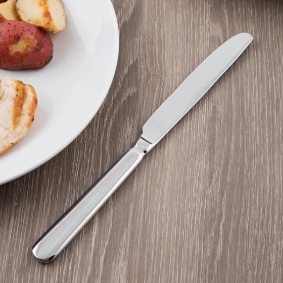 Libbey 213 5501 Baguette 9 3/4" 18/0 Stainless Steel Heavy Weight Serrated Solid Handle Dinner Knife - 36/Case