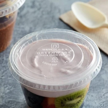 Fabri-Kal LGC12/20F Greenware 9, 12, and 20 oz. Compostable Clear Plastic Flat Lid without Straw Slot - 100/Pack