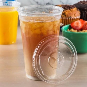 Fabri-Kal LKC16/24FX Kal-Clear / Nexclear 12 / 14, 16 / 18, 20, and 24 oz. Clear Plastic Flat Lid with Straw Slot - 100/Pack