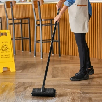 Lavex 10" Black Bi-Level Floor / Wall Scrub Brush with Squeegee and Black 60" Metal Handle