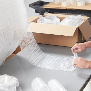 Lavex 12" x 100' Medium 5/16" Parcel Ready Perforated Bubble Roll