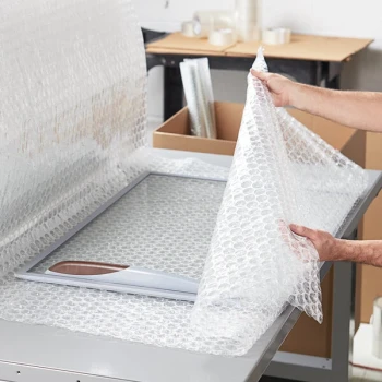 Lavex 48" x 100' Medium 5/16" Parcel Ready Perforated Bubble Roll
