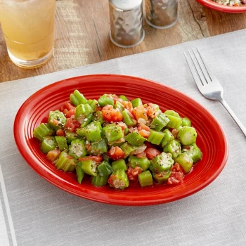 Acopa Capri 9 3/4" x 7" Passion Fruit Red Oval Stoneware Coupe Platter - Sample