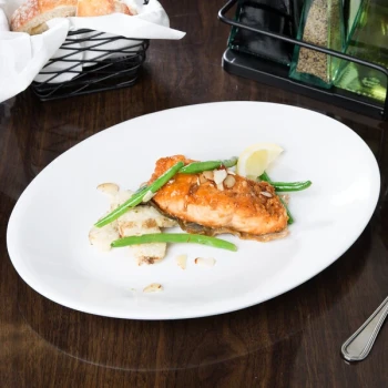 Libbey Porcelana 13 1/2" x 10" Bright White Oval Rolled Edge Coupe Platter - Sample