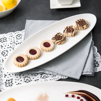 10 Strawberry Street WTR-16OVLEAF Whittier 15 7/8" x 5 3/8" White Oval Porcelain Leaf Platter - 24/Case