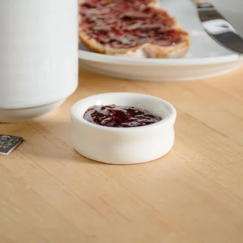 Tuxton BEX-0101 1 oz. Eggshell China Jelly Dish - 48/Case