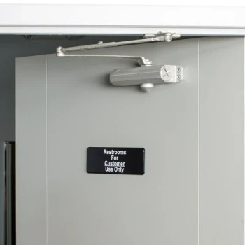 Vollrath 4525 Traex® Restrooms For Customer Use Only Sign - Black and White, 9" x 3"