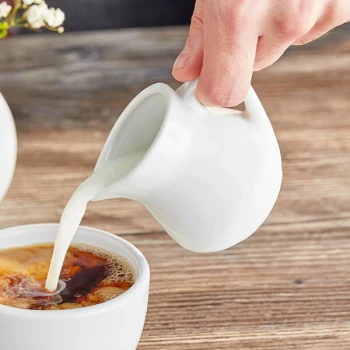 Acopa 3.5 oz. Bright White Porcelain Creamer - 48/Case