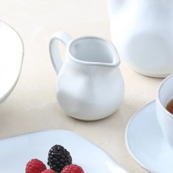 Tuxton GAA-100 TuxTrendz Artisan Agave 4 oz. China Creamer - 12/Case