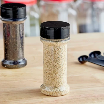 7 oz. Round Plastic Spice Container and 53/485 Black Induction-Lined Dual Flapper Lid with 7 Holes - 300/Case