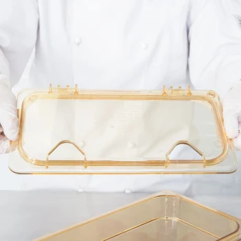 Carlisle 10479Z13 StorPlus EZ Access 1/3 Size Amber High Heat Hinged Lid with One Notch