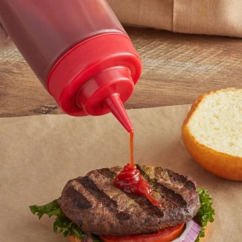 TableCraft 63TK Solid Red WideMouth™ Cone Tip Cap for Squeeze Bottles with a 63 mm Opening