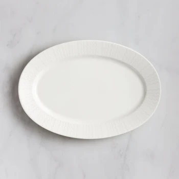 RAK Porcelain Leon 14 15/16" x 10 1/4" Ivory Embossed Wide Rim Porcelain Oval Platter - 6/Case