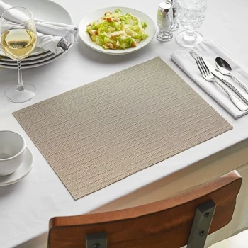 Front of the House Metroweave 16" x 12" Tan Rush Woven Vinyl Rectangle Placemat - 12/Pack