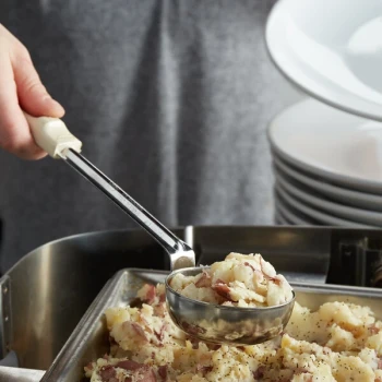 Vollrath 62167 3 oz. Ivory Solid Round Stainless Steel Spoodle® Portion Spoon with Grip 'N Serve® Handle