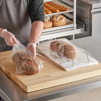 LK Packaging 10BG-097515W 9 3/4" x 4 1/2" x 15" Plastic Food / Bread Bag on Wicket Dispenser - 1,000/Box