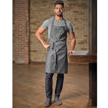 Mercer Culinary M63200DEN Metro Edge Flannery Indigo Dobby Denim Bib Apron with Adjustable Neck, Leather Towel Holder, and 3 Pockets - 34 1/4" x 30 3/4"
