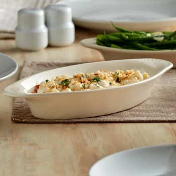 Acopa 15 oz. Ivory (American White) Oval Stoneware Rarebit - 12/Pack
